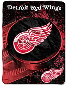 Officially Licensed NHL "Ice Dash" Micro Raschel Throw Blanket, 46" x 60"